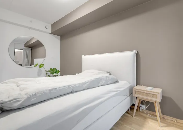 아파트 Moderne Sentral Toppleilighet Med Utsikt Til Fjellheisen Og Tromsdalstind 트롬쇠